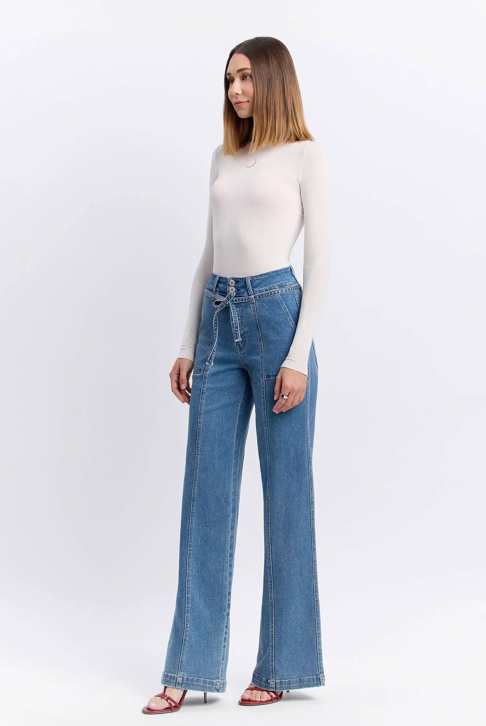 Vervet Olivia Super High Rise Wide Leg Jeans with Tie Waistband in Blue Denim shown on model