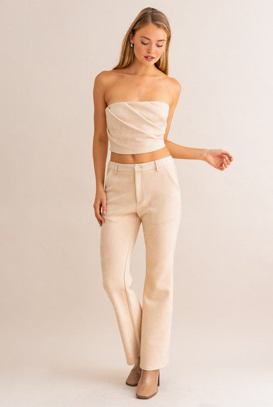 Beige crop top and pants outfit.