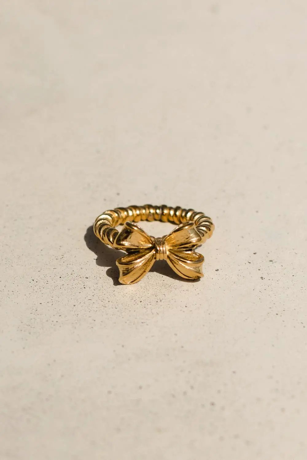 Panache Apparel Co. The Luxe Gold Textured Bow Ring - Rings
