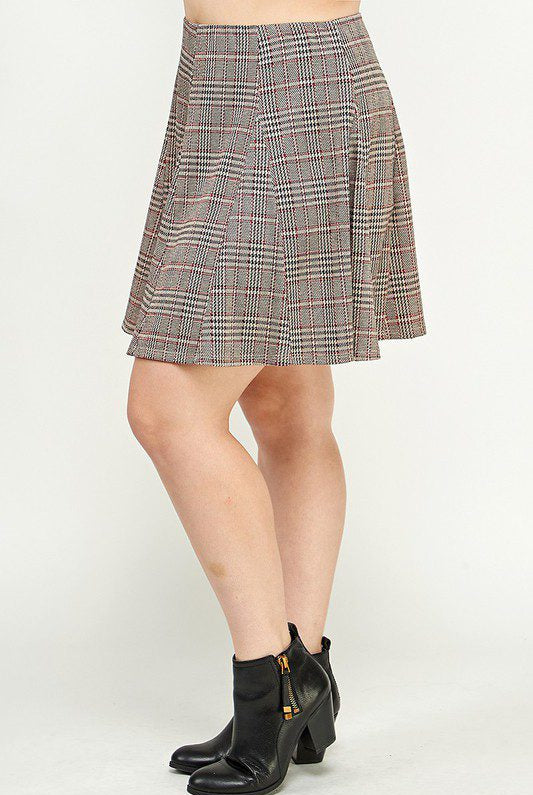 Plaid skater skirt and black ankle boots.