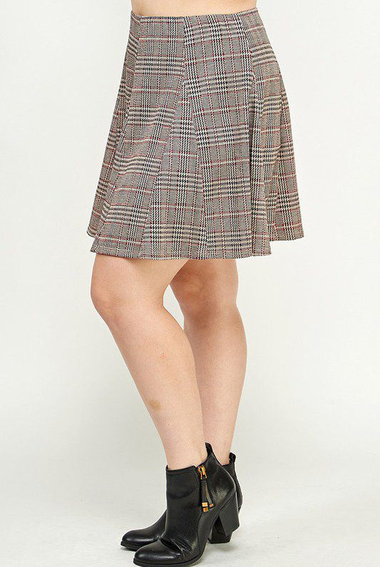 Plaid skater skirt and black ankle boots.