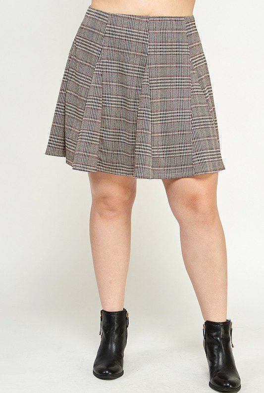 Plaid skater skirt and black boots.