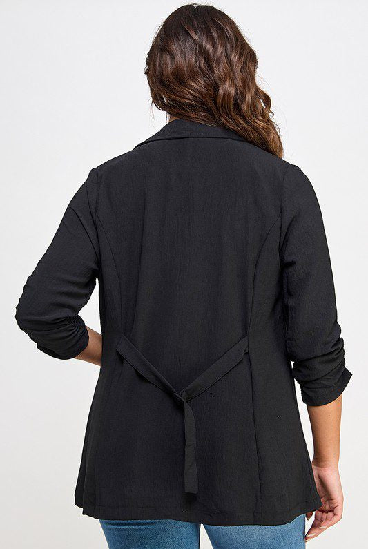 Black women's blazer, back view.