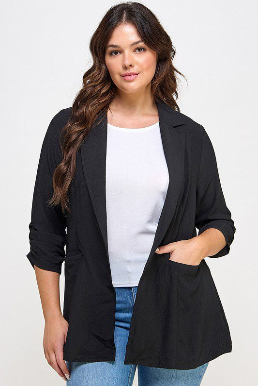 Black blazer, woman, three-quarter sleeves.