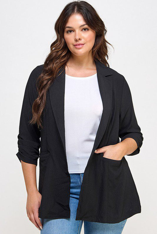 Black blazer, woman, three-quarter sleeves.