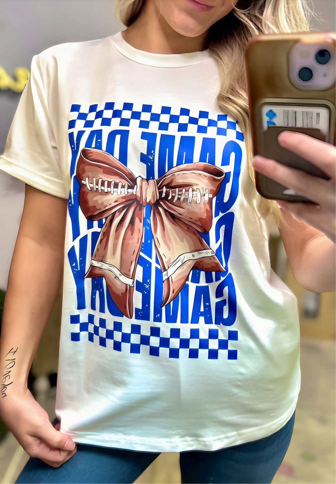 Grateful Threads Boutique White Football Bowknot Game Day Graphic Tee - T-Shirts White Rugby Bowknot Game Day Graphic Tee