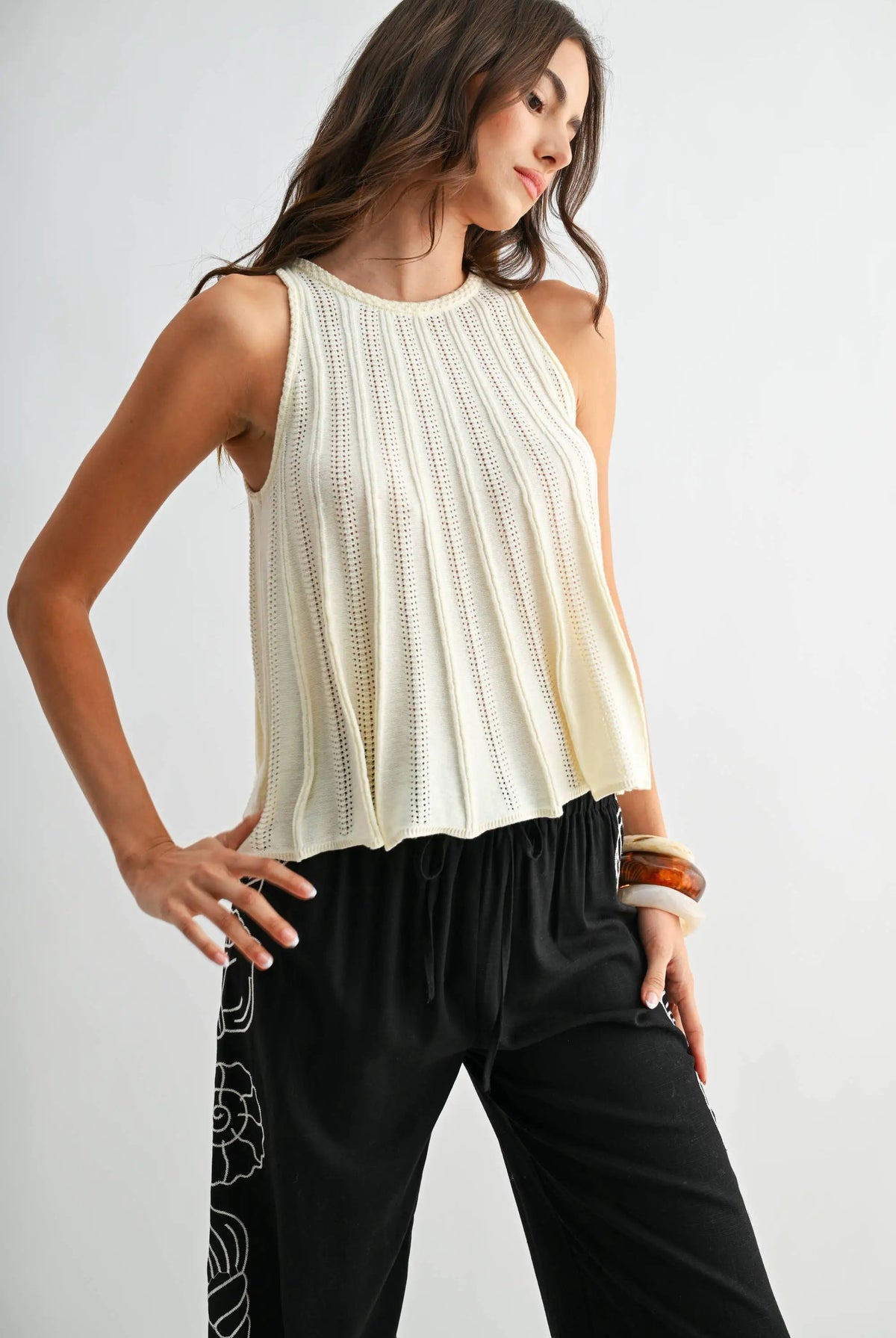 Camellia The Sleeveless Knit Top with Flared Hem: CREAM - Tank Tops