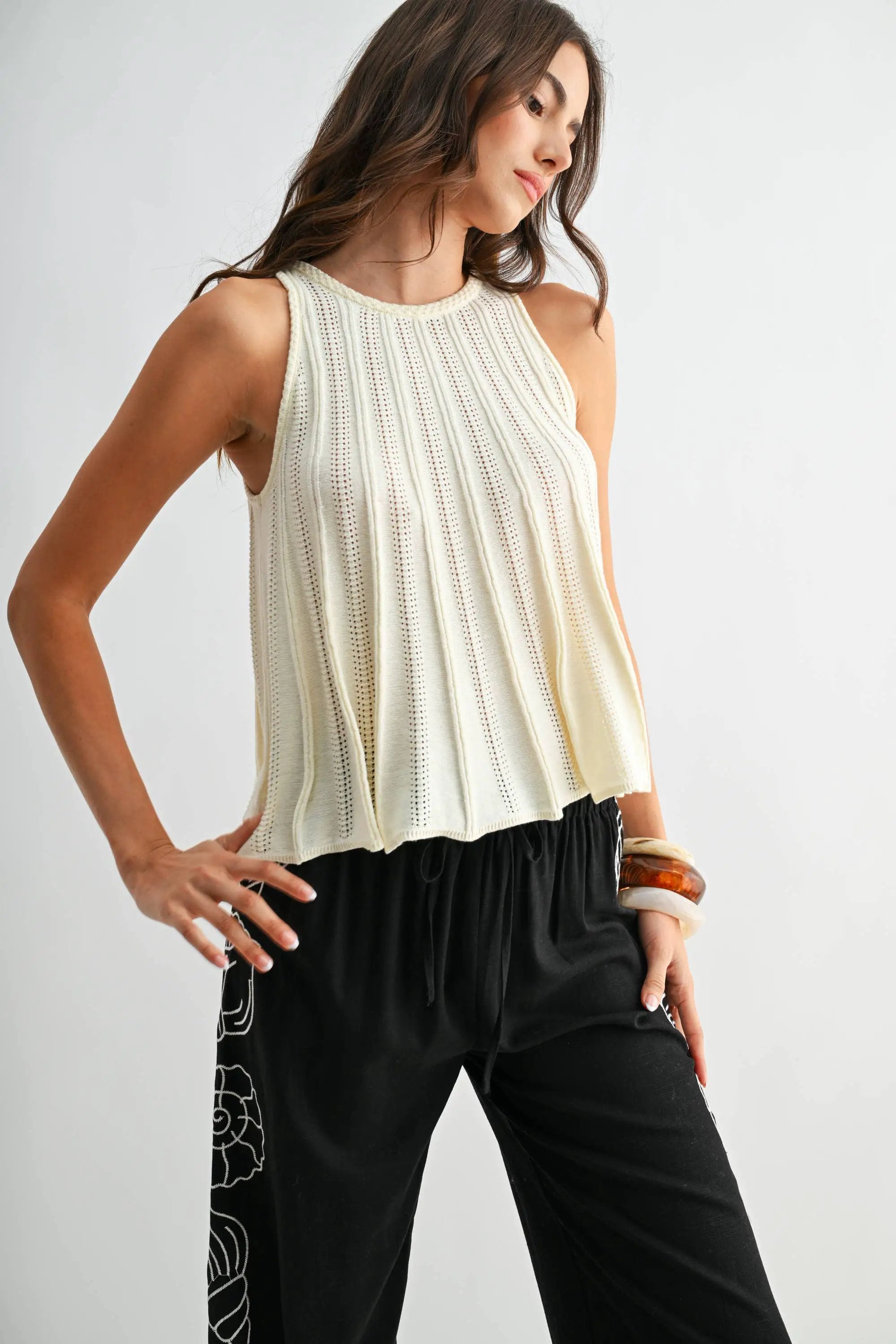 Camellia The Sleeveless Knit Top with Flared Hem: CREAM - Tank Tops