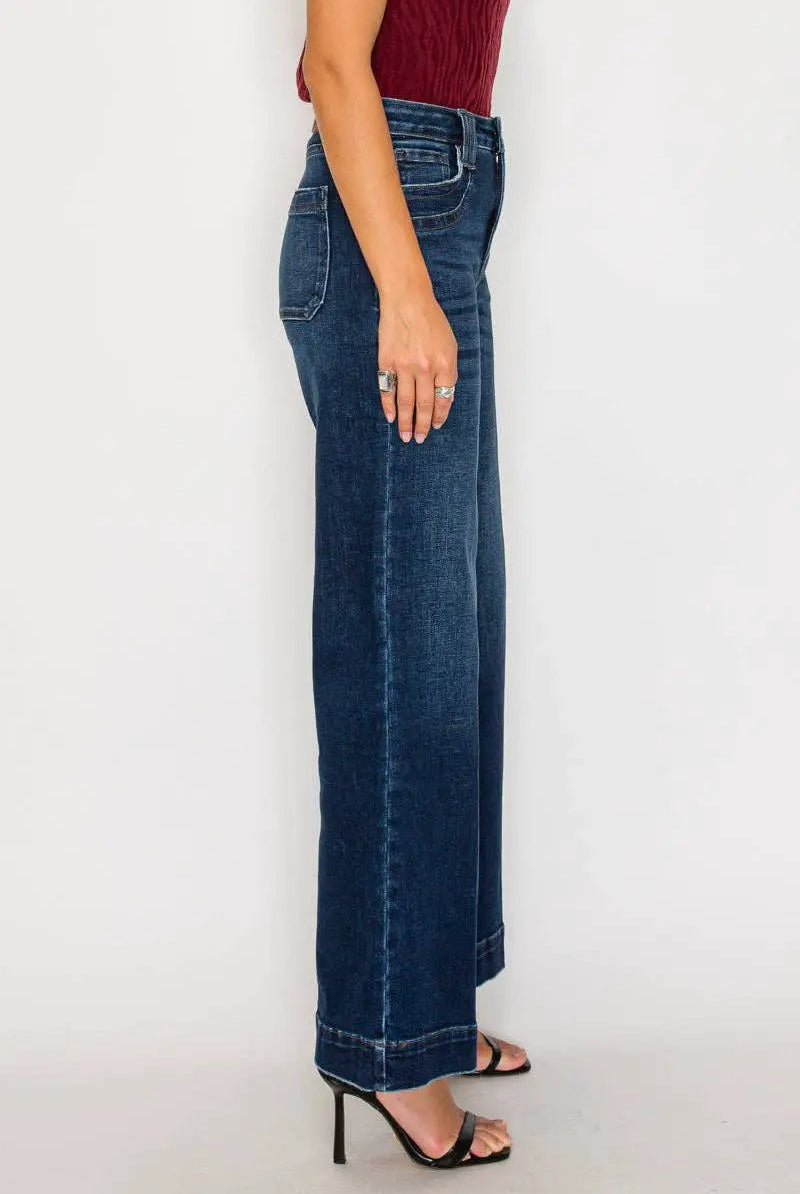 ARTEMIS VINTAGE tummy-control high-rise A-line wide-leg jeans in dark stone wash, side view.