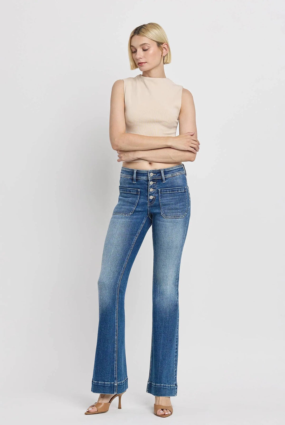 Vervet Alison mid rise flare jeans with button fly, patch pockets and trouser hem in Glenfiddich blue