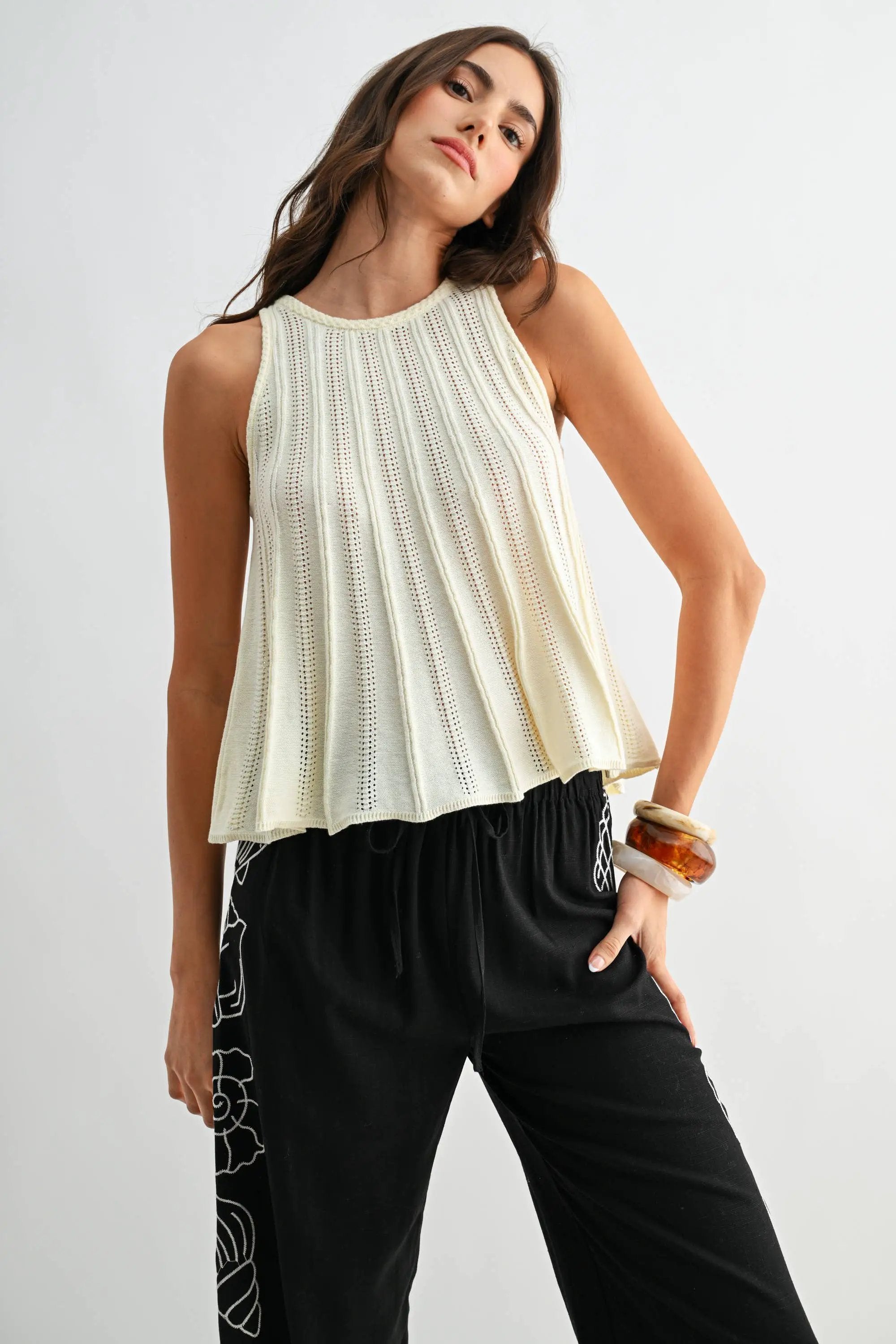 Camellia The Sleeveless Knit Top with Flared Hem: CREAM - Tank Tops