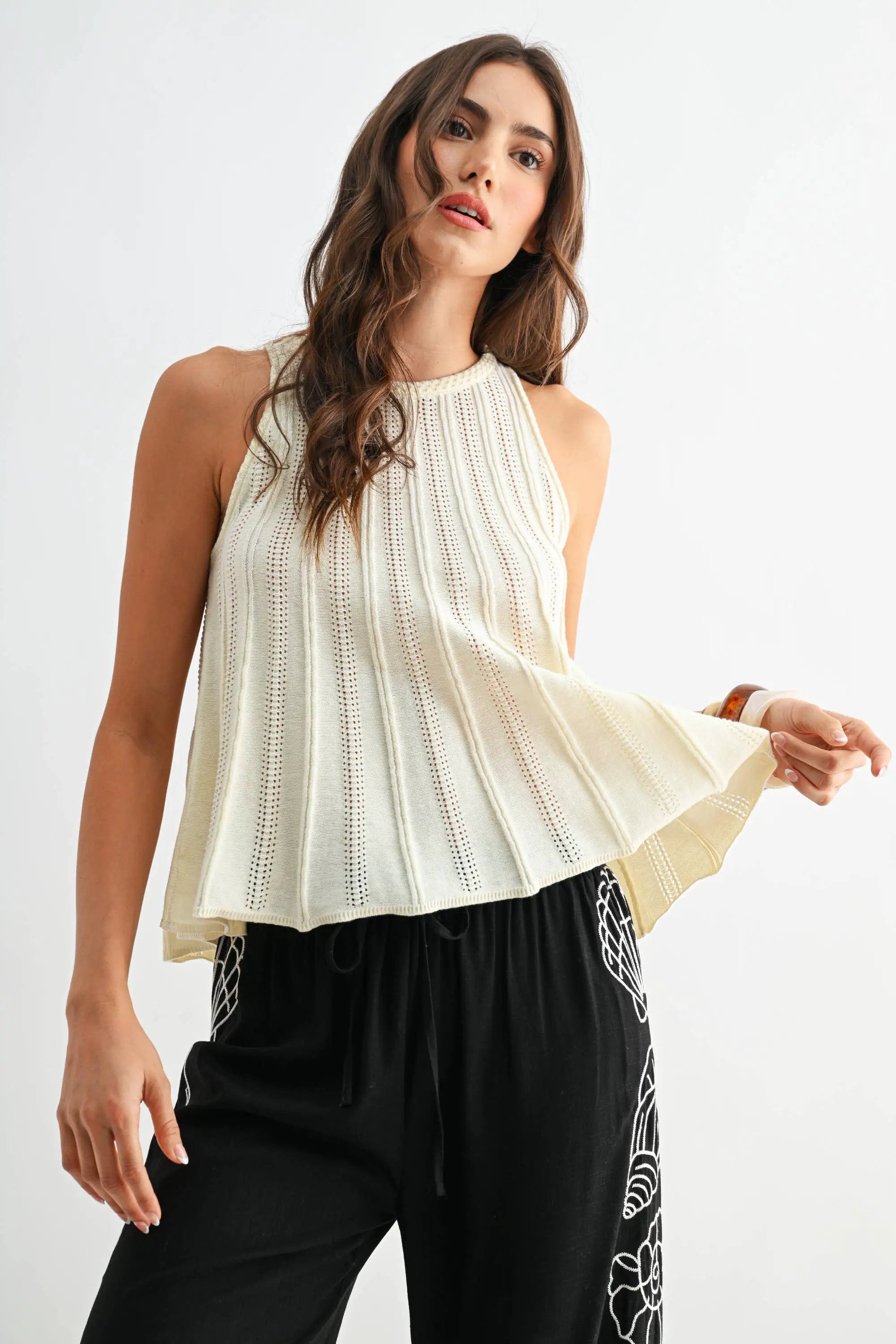 Camellia The Sleeveless Knit Top with Flared Hem: CREAM - Tank Tops