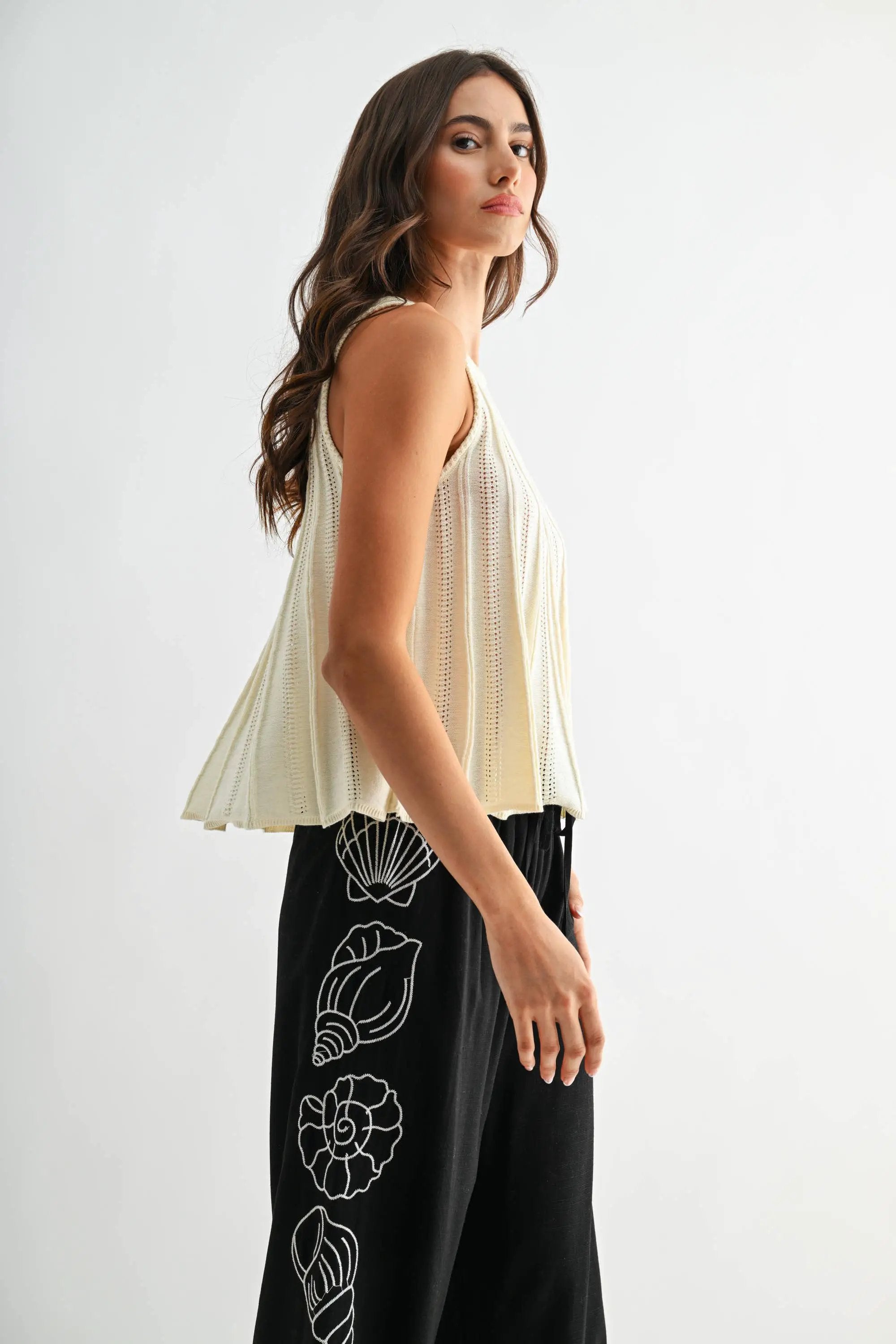 Camellia The Sleeveless Knit Top with Flared Hem: CREAM - Tank Tops