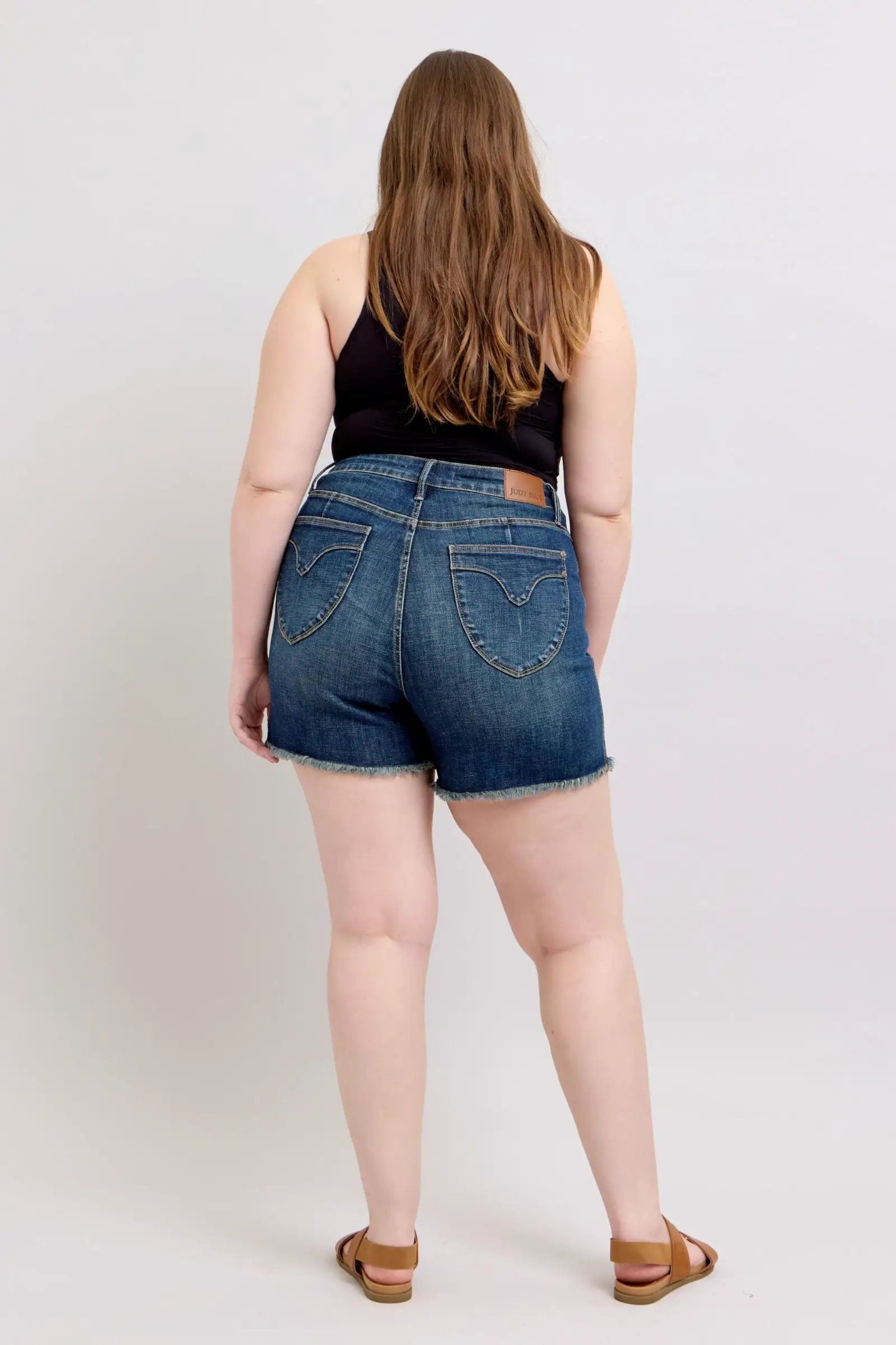 Judy Blue Judy Blue High Waisted Tummy Control Frayed Hem & Shield Back Pocket Dark Blue Denim Shorts PLUS - Shorts Judy Blue High Waisted Tummy Control Frayed Hem & Shield Back Pocket Dark Blue Denim Shorts PLUS