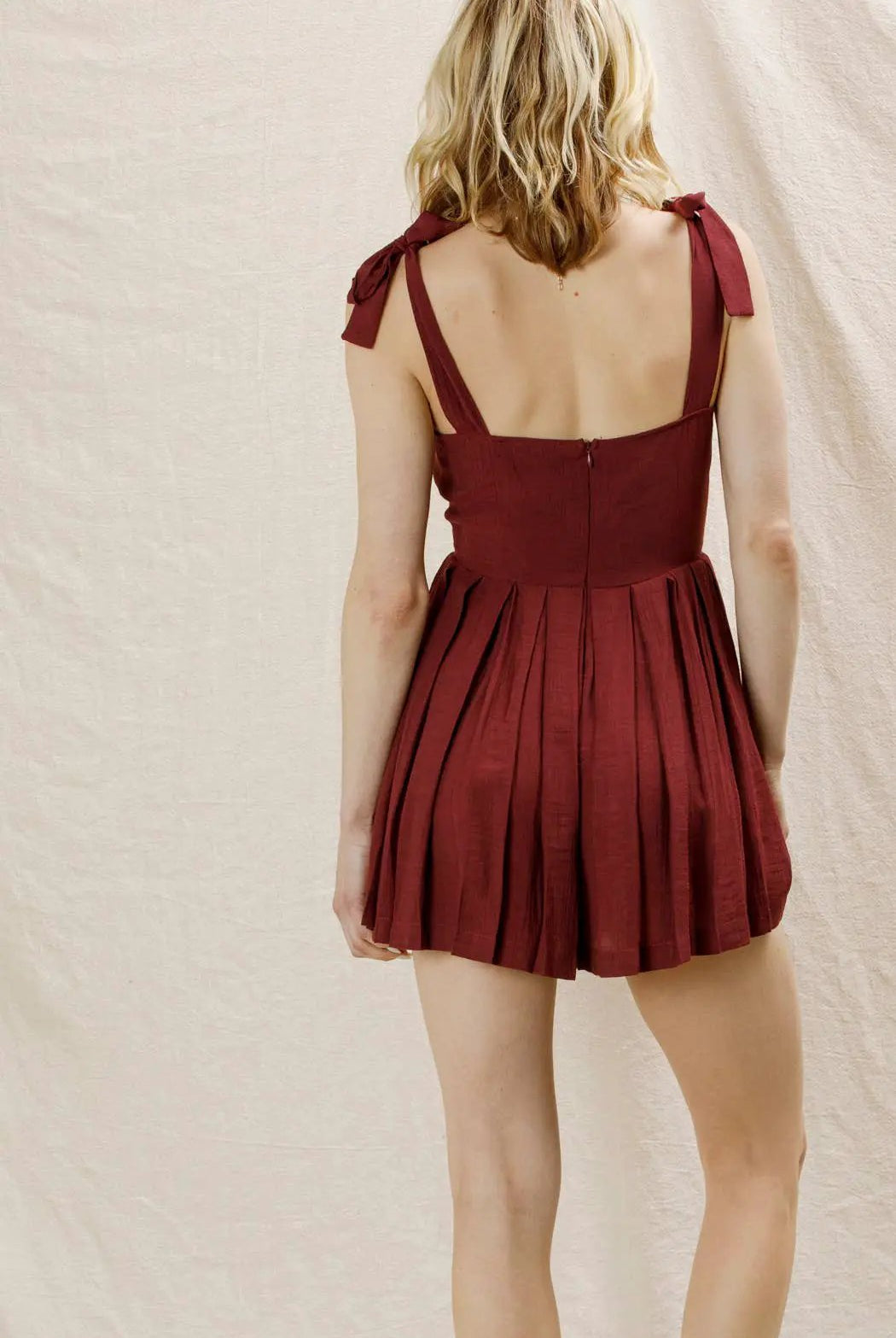 En Crème En Crème Wine Shoulder Tie Pleated Romper - One-Pieces shoulder tie pleated romper