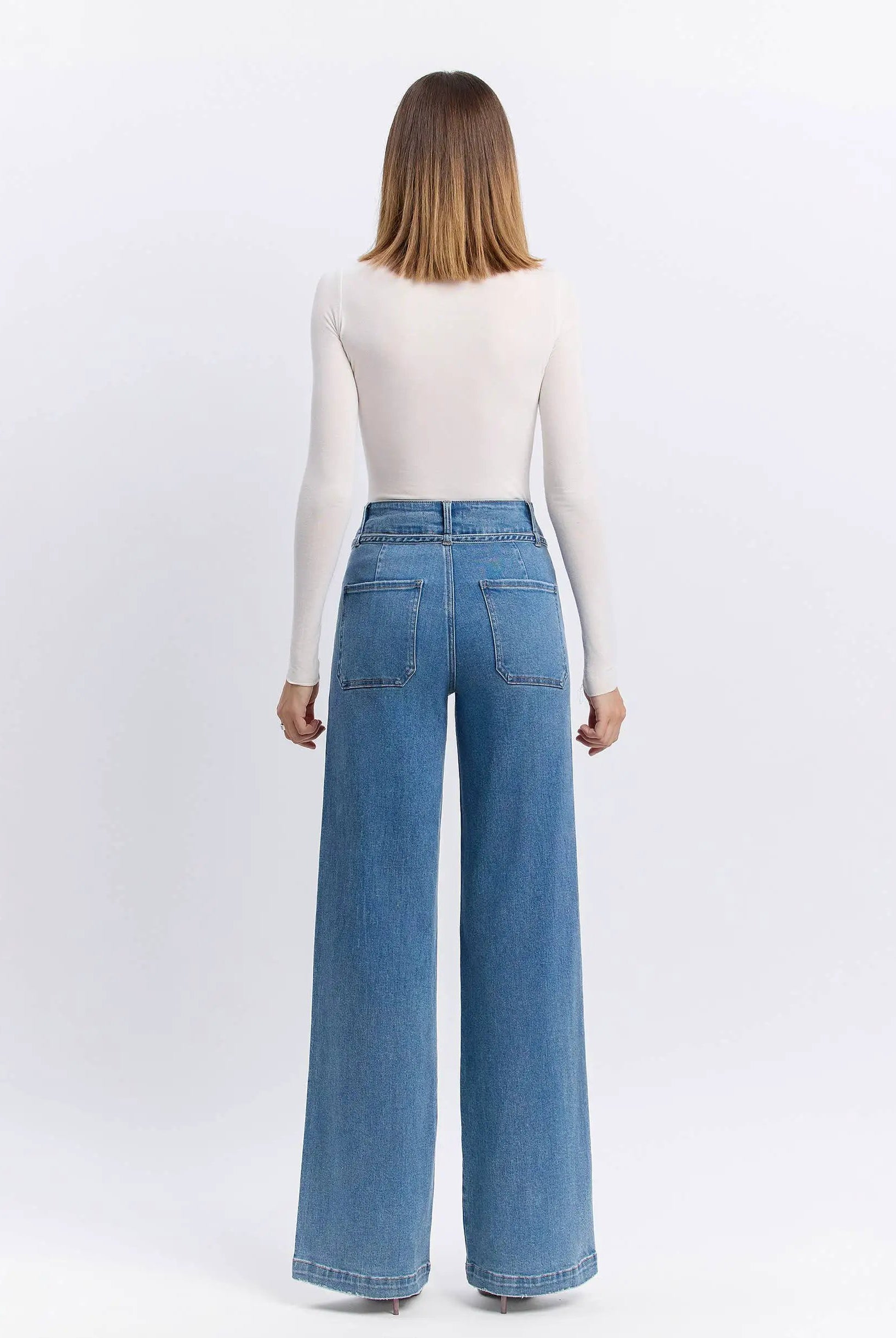 Back view of Vervet Olivia super high rise tie waistband wide leg jeans in Lush Life color