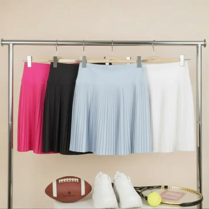 New In Pleated Activewear Skirt with Shorts - Activewear