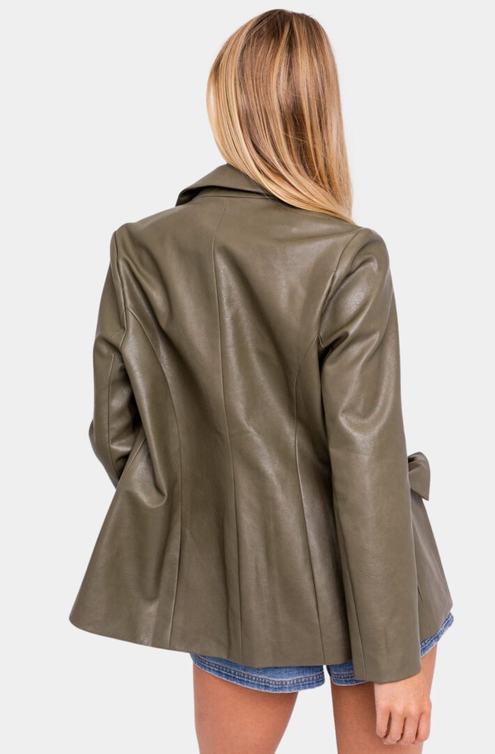 Olive green faux leather blazer, back view.