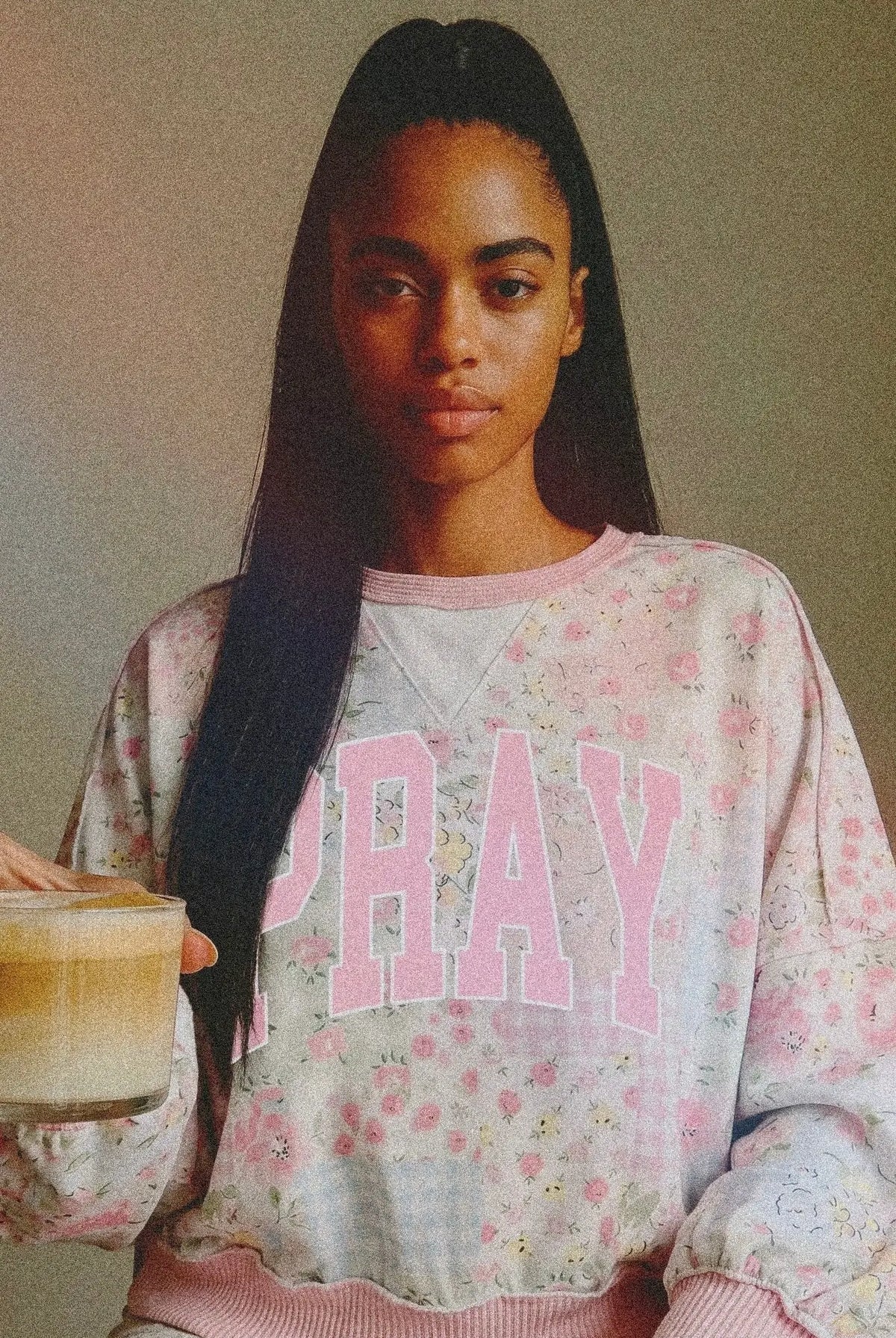 Graphic sweatshirt by Grateful Threads Boutique featuring pink floral granny-quilt print and large PRAY lettering
