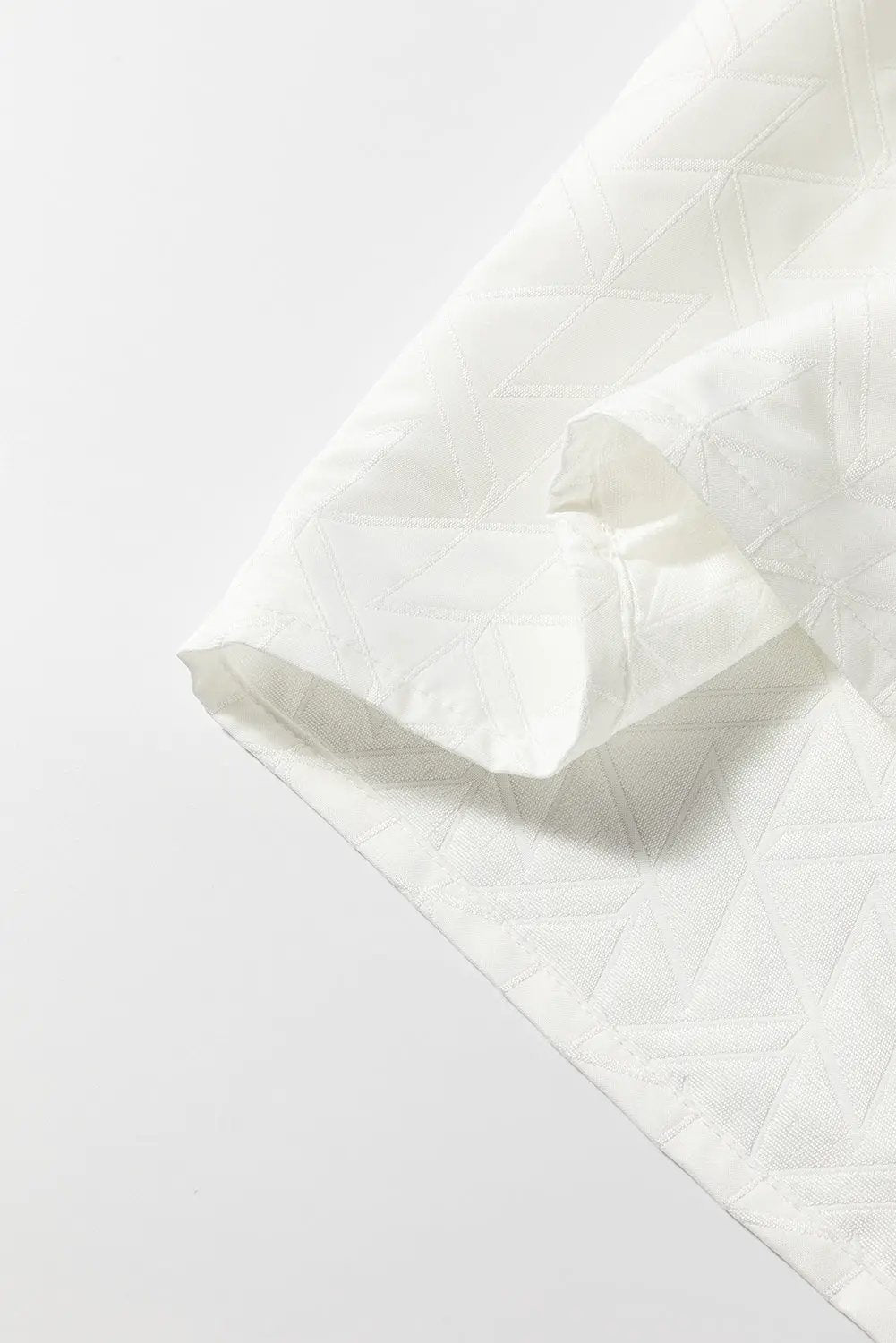 Grateful Threads Boutique White Geometric Textured Short Sleeve Frilly V Neck Blouse - Blouses White Geometric Textured Short Sleeve Frilly V Neck Blouse