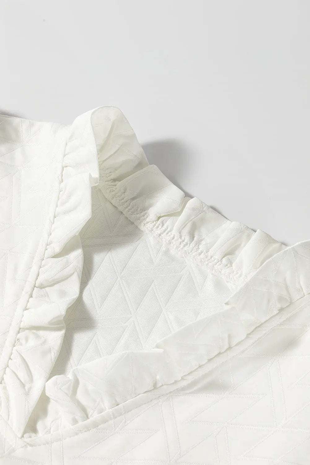 Grateful Threads Boutique White Geometric Textured Short Sleeve Frilly V Neck Blouse - Blouses White Geometric Textured Short Sleeve Frilly V Neck Blouse