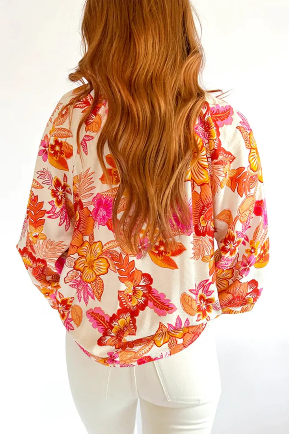 Grateful Threads Boutique Orange Floral Print Pearl Button Keyhole Long Puff Sleeve Blouse - Blouses Orange Floral Print Pearl Button Keyhole Long Puff Sleeve Blouse