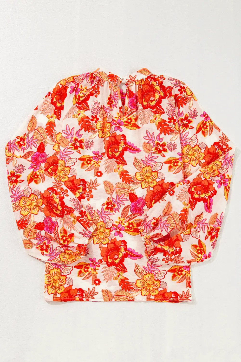 Grateful Threads Boutique Orange Floral Print Pearl Button Keyhole Long Puff Sleeve Blouse - Blouses Orange Floral Print Pearl Button Keyhole Long Puff Sleeve Blouse