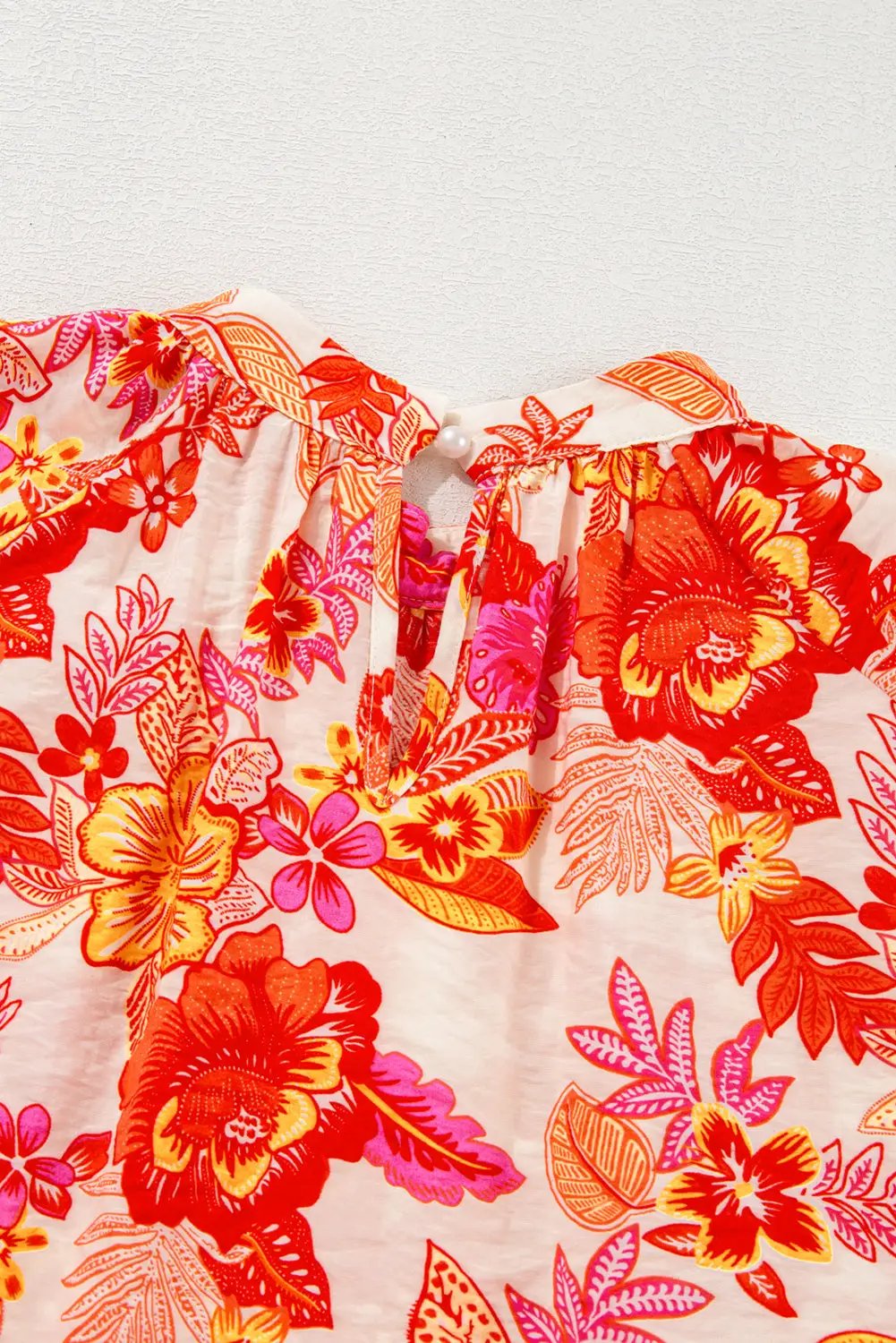 Grateful Threads Boutique Orange Floral Print Pearl Button Keyhole Long Puff Sleeve Blouse - Blouses Orange Floral Print Pearl Button Keyhole Long Puff Sleeve Blouse