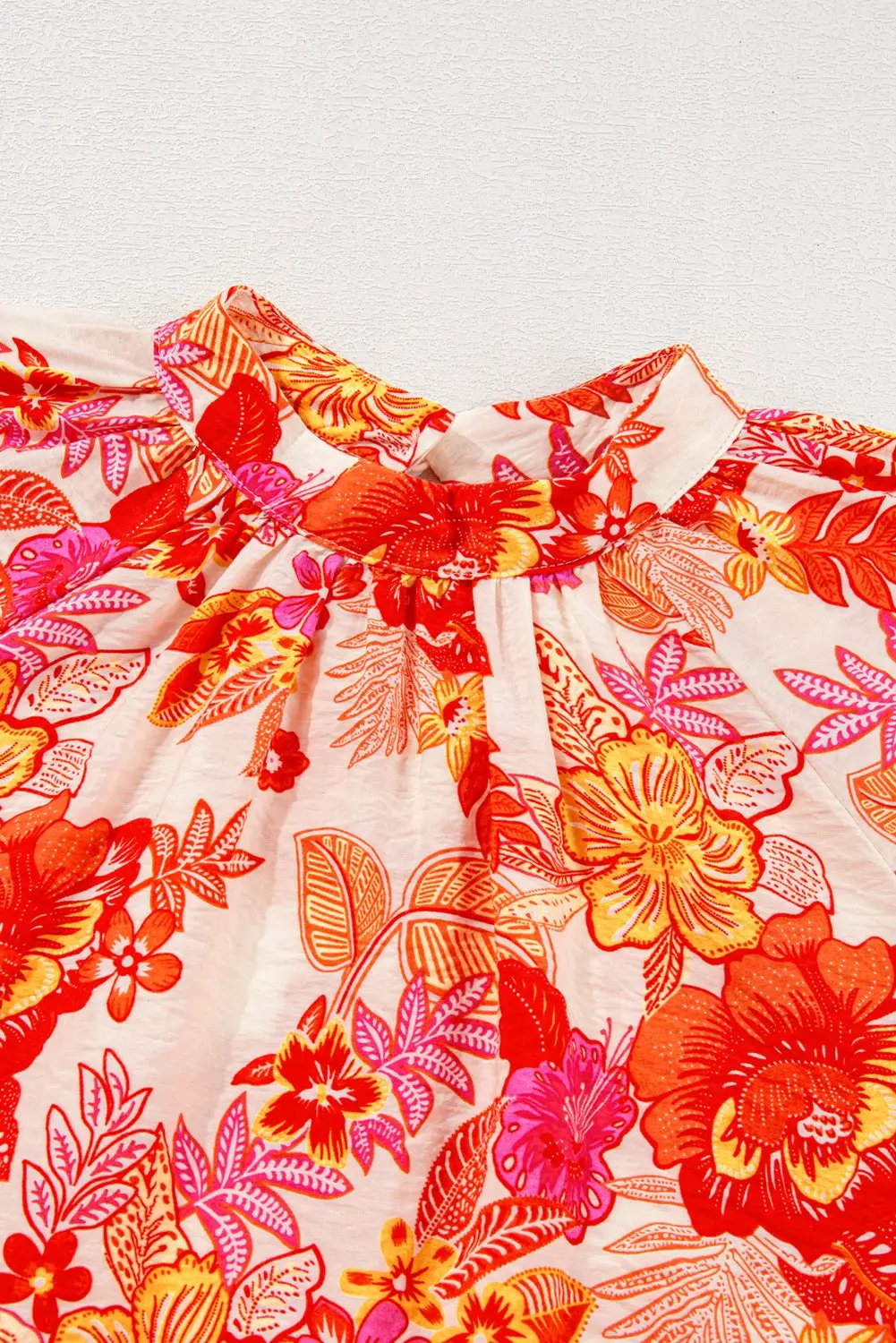 Grateful Threads Boutique Orange Floral Print Pearl Button Keyhole Long Puff Sleeve Blouse - Blouses Orange Floral Print Pearl Button Keyhole Long Puff Sleeve Blouse
