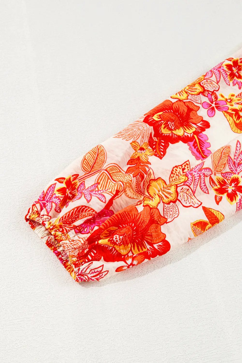 Grateful Threads Boutique Orange Floral Print Pearl Button Keyhole Long Puff Sleeve Blouse - Blouses Orange Floral Print Pearl Button Keyhole Long Puff Sleeve Blouse