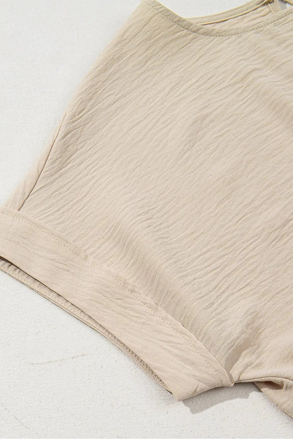 Grateful Threads Boutique Parchment Knotted Hem Short Sleeve Blouse – Effortless Chic Style - Blouses Parchment Solid Color Knotted Hem Short Sleeve Blouse