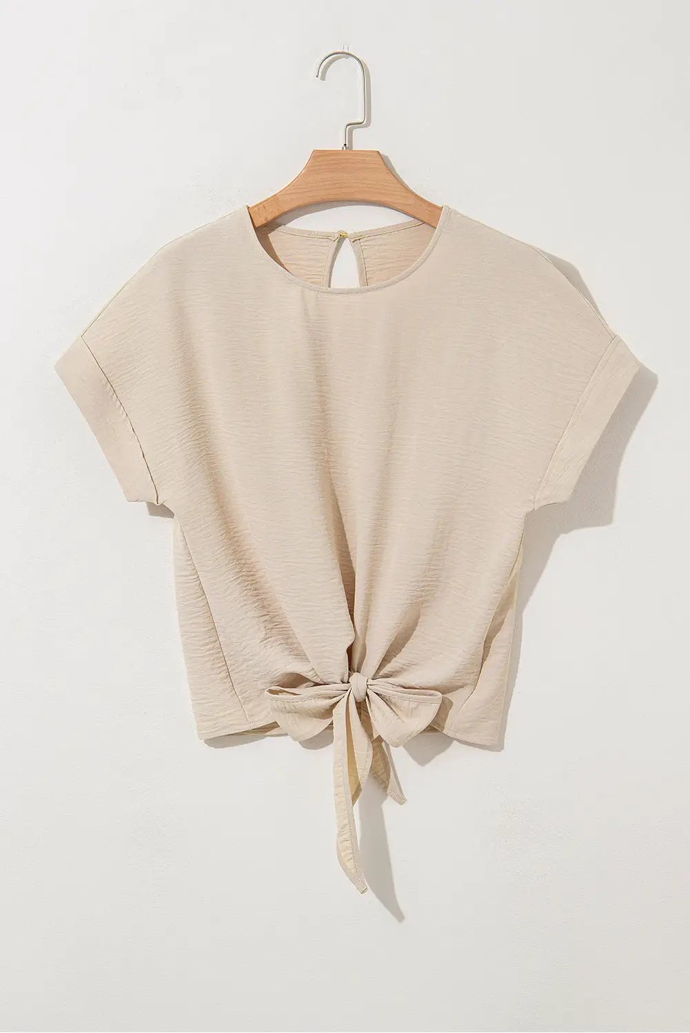 Grateful Threads Boutique Parchment Knotted Hem Short Sleeve Blouse – Effortless Chic Style - Blouses Parchment Solid Color Knotted Hem Short Sleeve Blouse