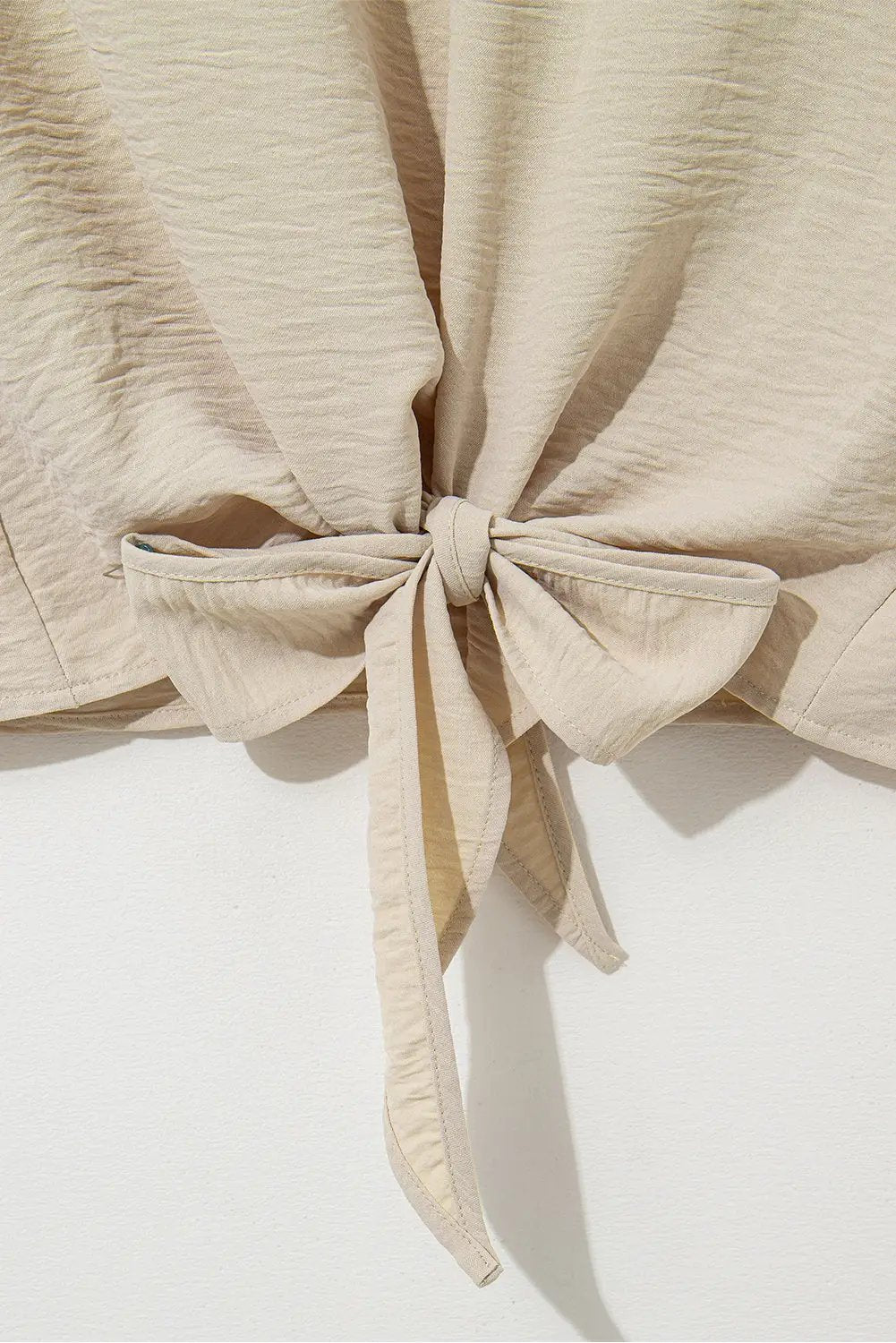 Grateful Threads Boutique Parchment Knotted Hem Short Sleeve Blouse – Effortless Chic Style - Blouses Parchment Solid Color Knotted Hem Short Sleeve Blouse
