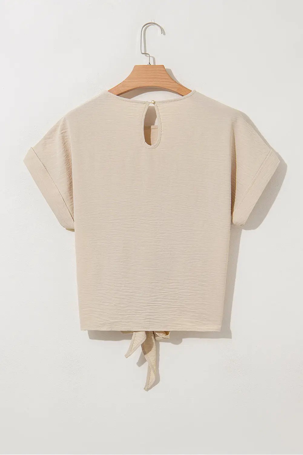 Grateful Threads Boutique Parchment Knotted Hem Short Sleeve Blouse – Effortless Chic Style - Blouses Parchment Solid Color Knotted Hem Short Sleeve Blouse