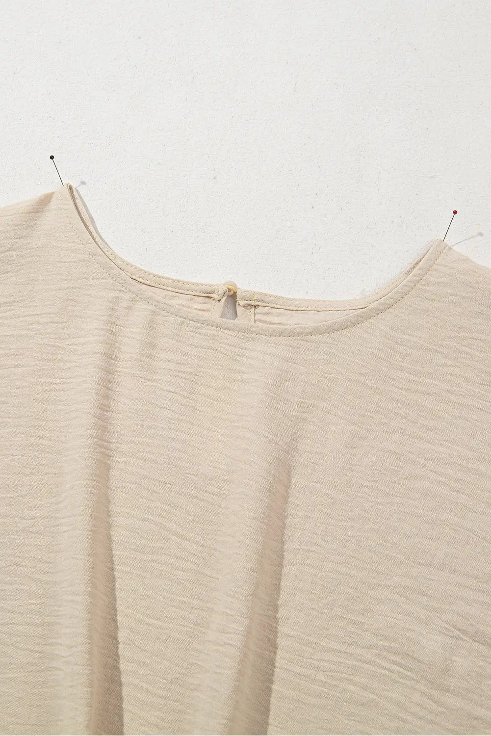 Grateful Threads Boutique Parchment Knotted Hem Short Sleeve Blouse – Effortless Chic Style - Blouses Parchment Solid Color Knotted Hem Short Sleeve Blouse
