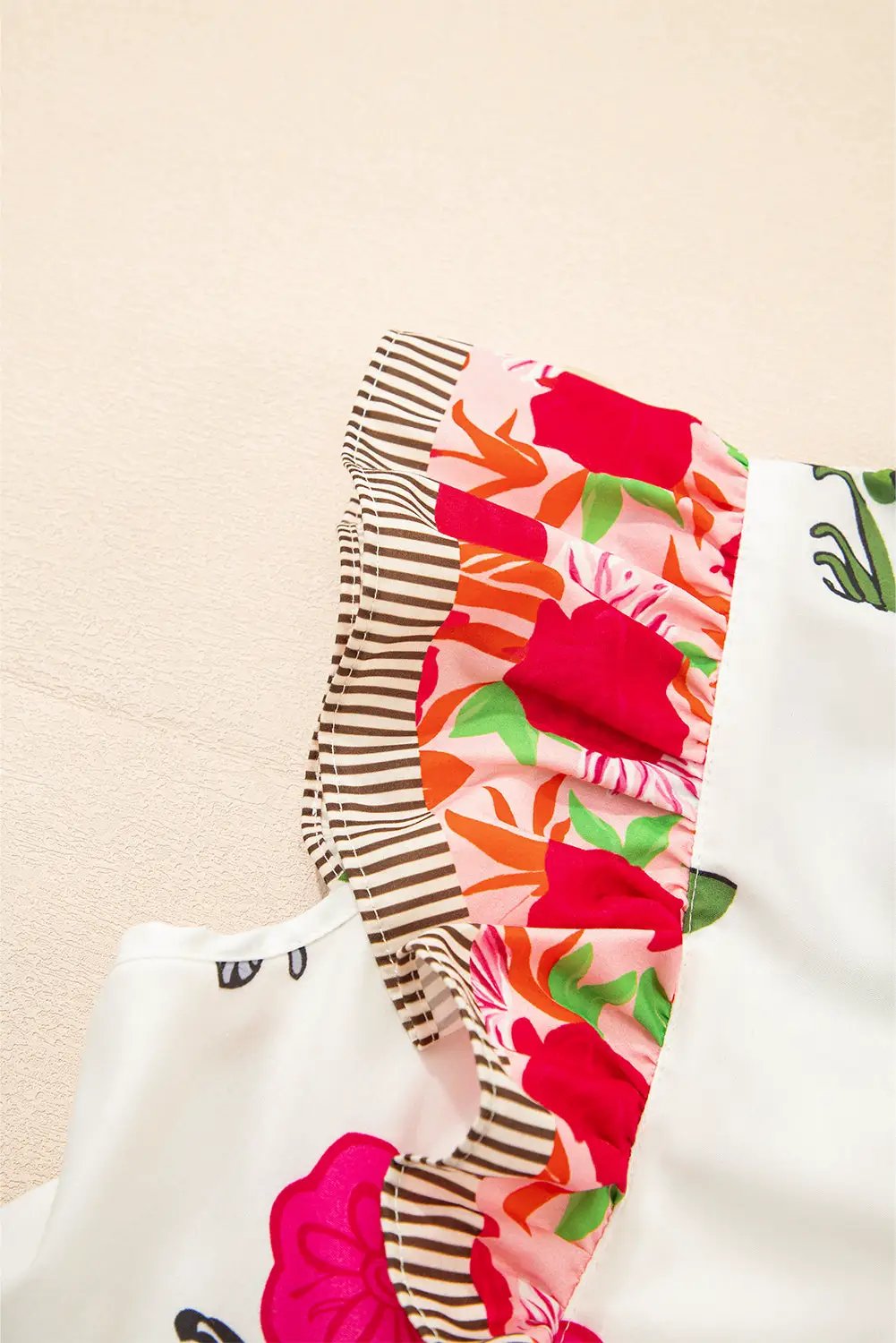 Grateful Threads Boutique The Flirt & Flutter Floral Blouse - Blouses floral sleeveless flutter sleeve blouse