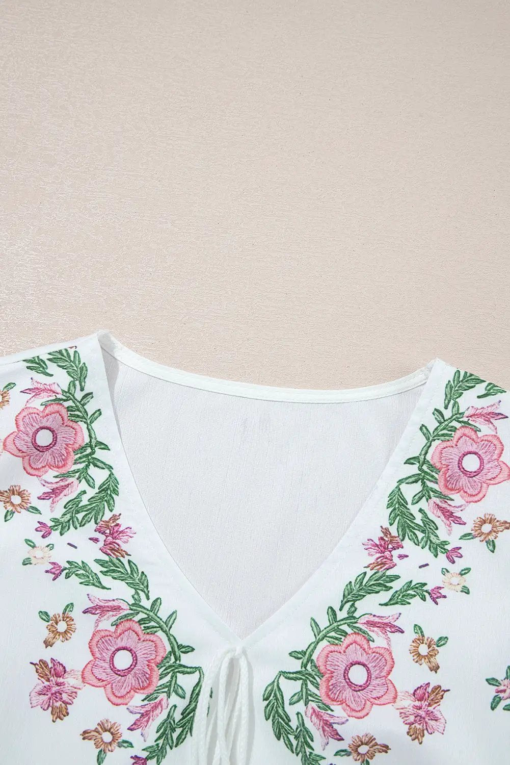 Grateful Threads Boutique White Flower Lace-up V Neck Babydoll Blouse - Blouses White Flower Lace-up V Neck Babydoll Blouse