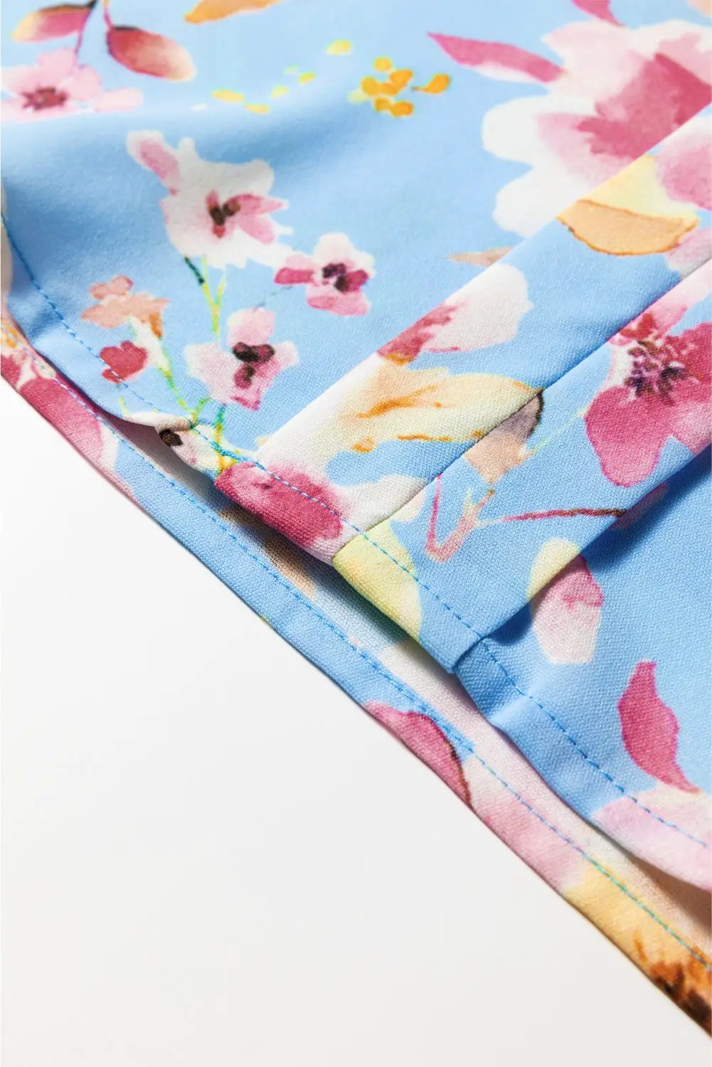 Grateful Threads Boutique Sky Blue Floral Smocked Cuff Flounce Sleeve V Neck Blouse - Blouses Sky Blue Floral Smocked Cuff Flounce Sleeve V Neck Blouse