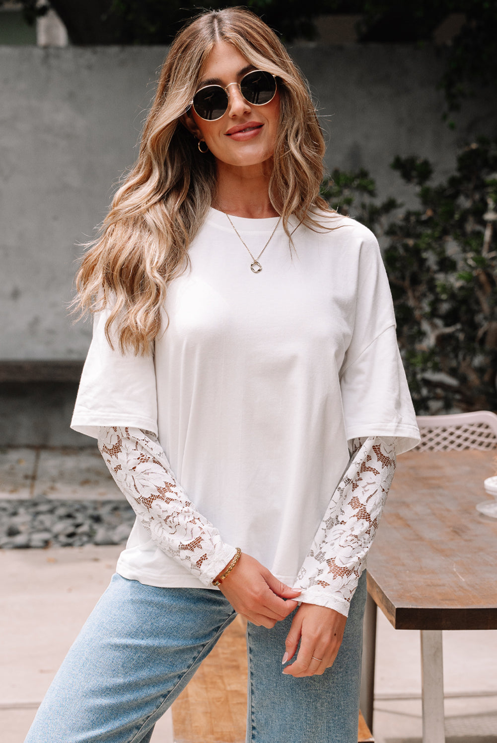 front of white lace sleeve tee with drop shoulder fit on model
