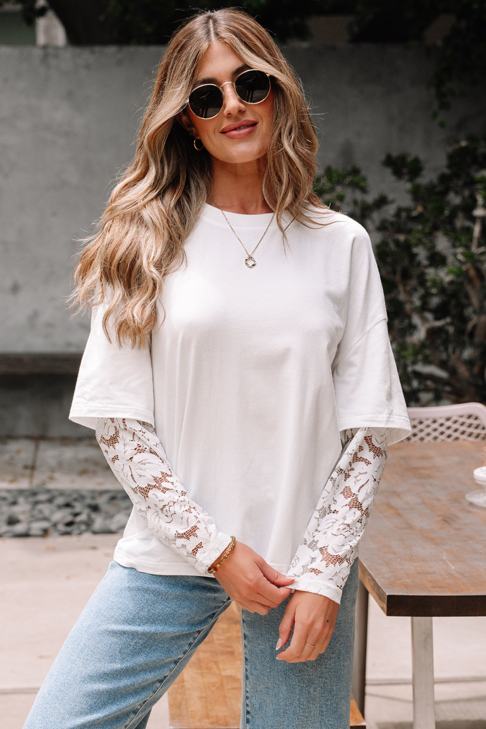 front of white lace sleeve tee with drop shoulder fit on model