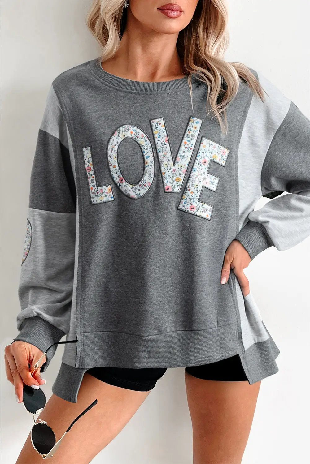 Grateful Threads Boutique Love in Bloom Patchwork Sweatshirt - Sweatshirts Dark Gray LOVE Valentine Graphic Exposed Seam Patchwork Uneven Hem Chic Sweatshirt