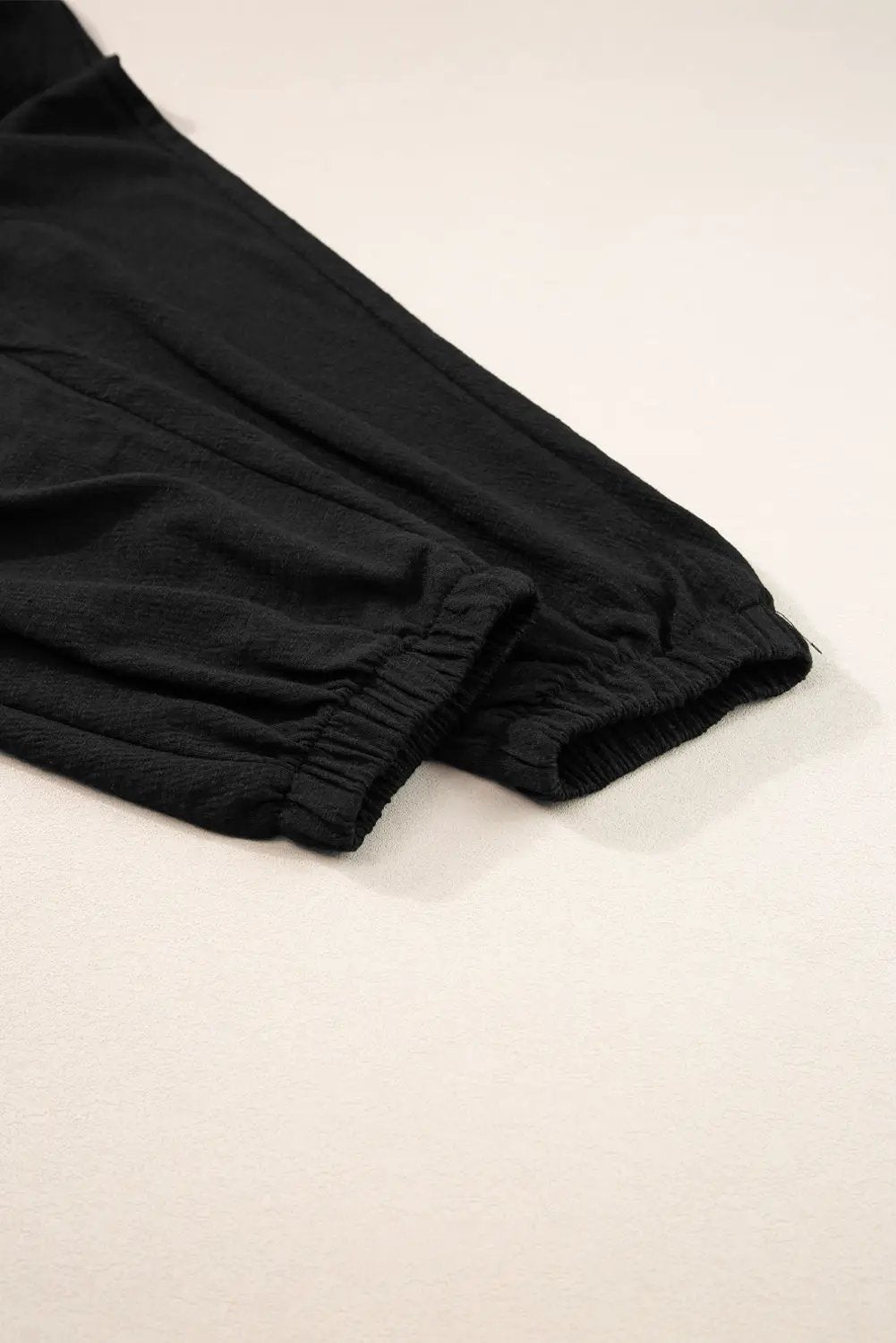 Grateful Threads Boutique Black Shirred High Waist Sleeveless V-Neck Jumpsuit - One-Pieces Black Shirred High Waist Sleeveless V Neck Jumpsuit