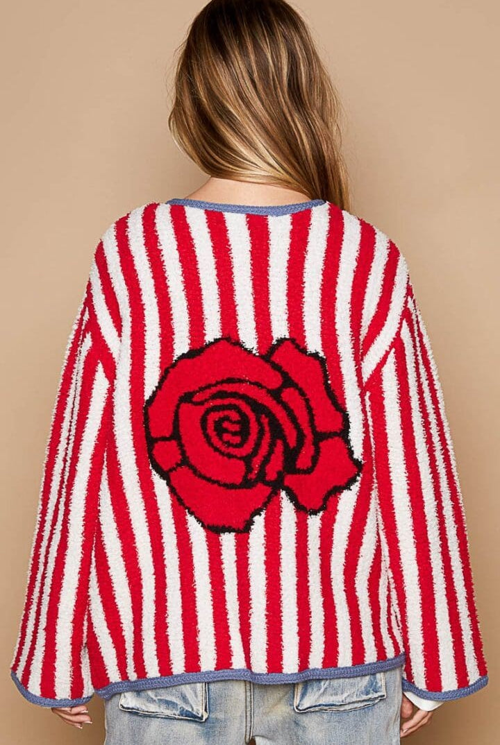 Red and white striped sweater with rose.