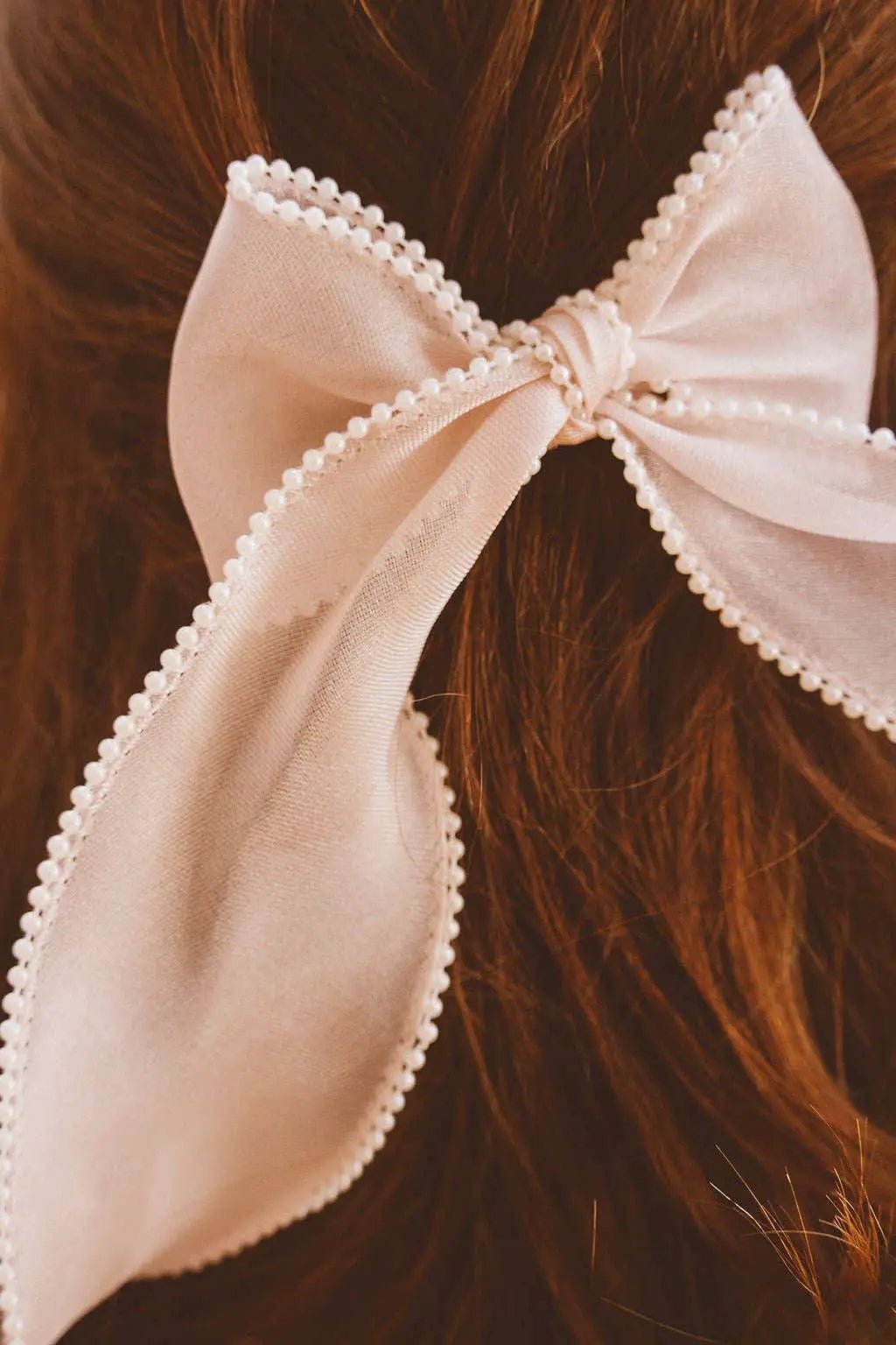 Shop ANDi The Pearl Lined Bow Clip - Hair Pins, Claws & Clips Pearl Long bow hair clip