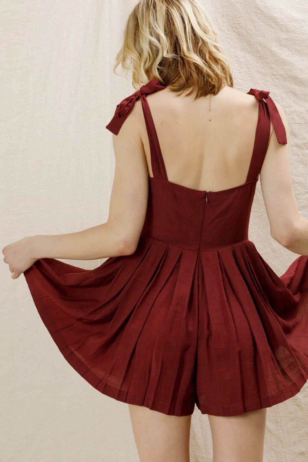 En Crème En Crème Wine Shoulder Tie Pleated Romper - One-Pieces shoulder tie pleated romper