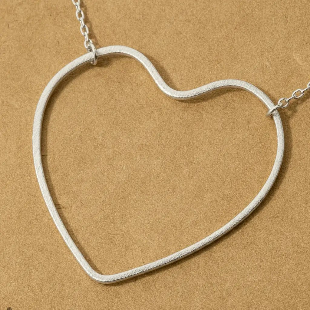 Fame Accessories The Heart Cutout Pendant Necklace: Silver - Necklaces