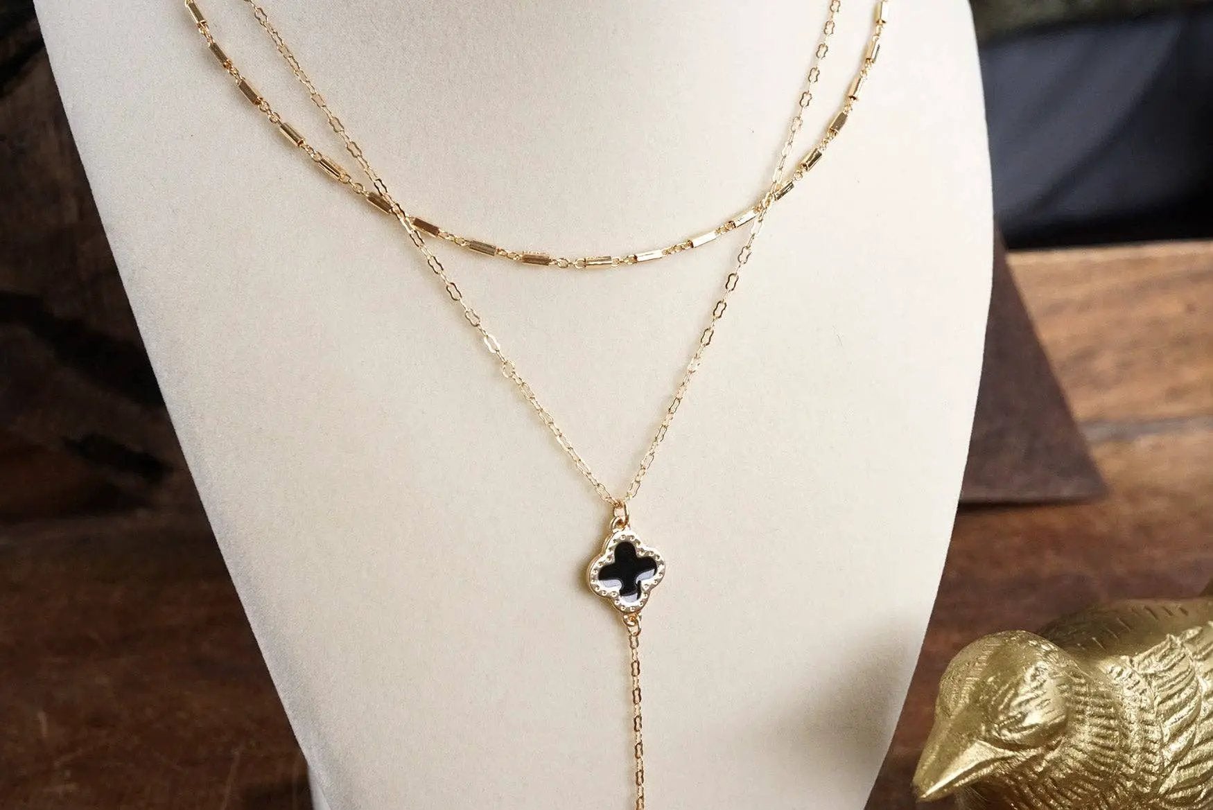 PennyLine inc The Golden Clover Lariat Necklace: Black - Necklaces
