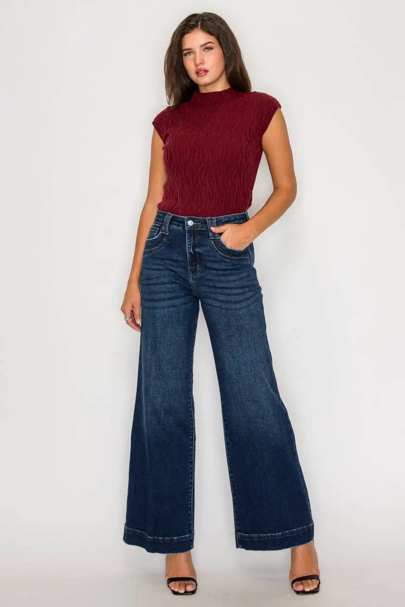 ARTEMIS VINTAGE tummy control high-rise A-line wide-leg jeans in dark stone wash.