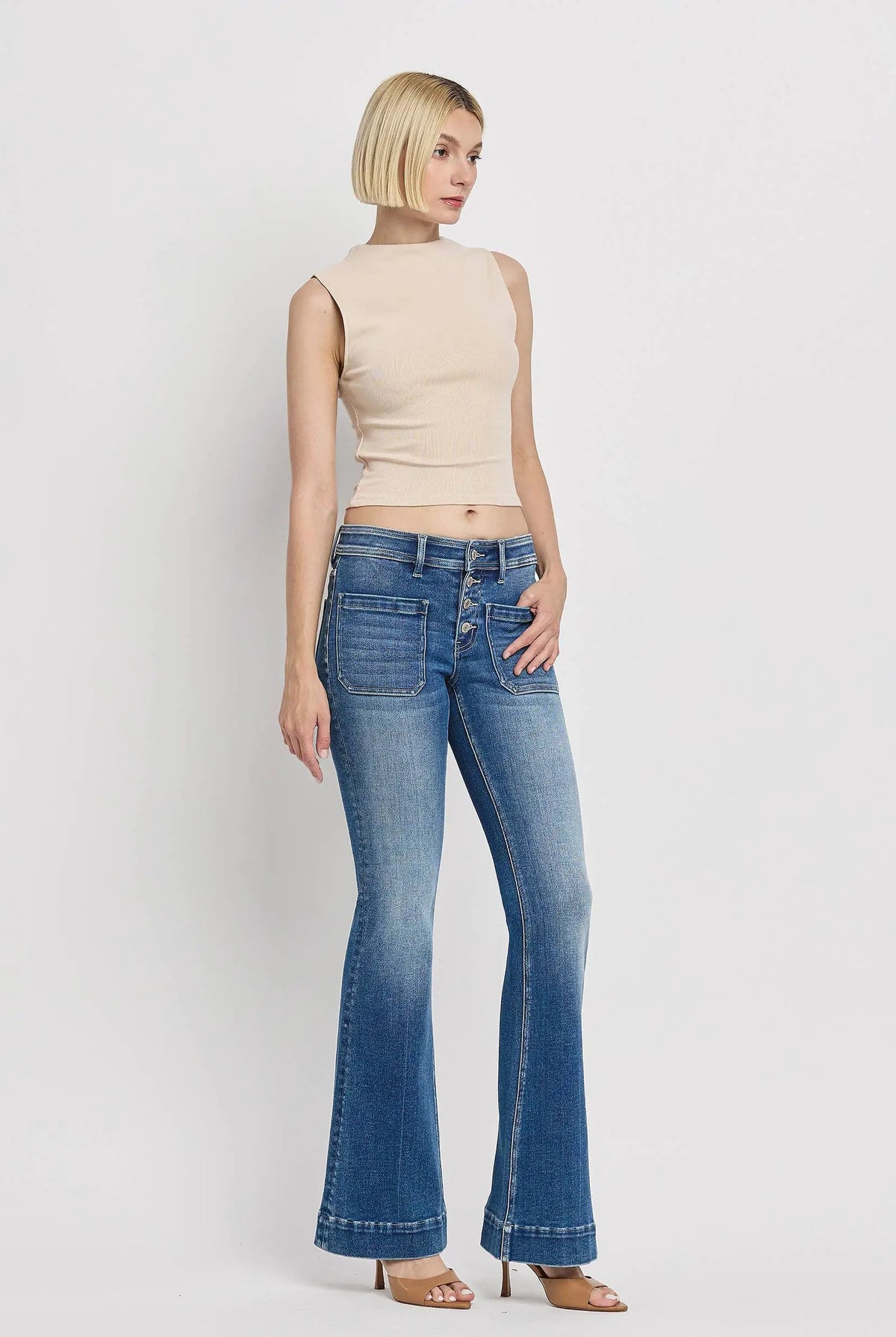 Vervet Alison mid rise flare jeans in Gleefully with button fly and trouser hem