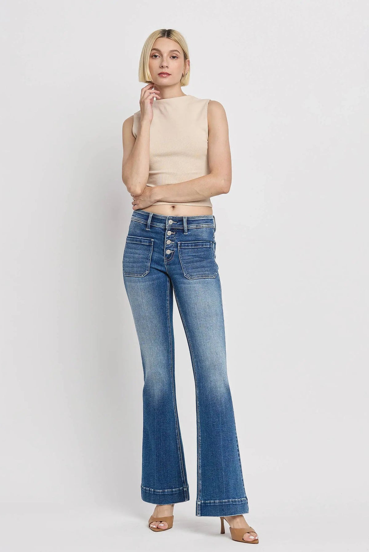 Vervet Alison mid rise flare jeans with button fly and trouser hems in blue